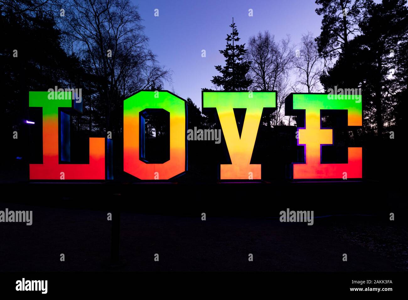 LOVE - a light artwork by Jouni Väänänen at twilight Stock Photo