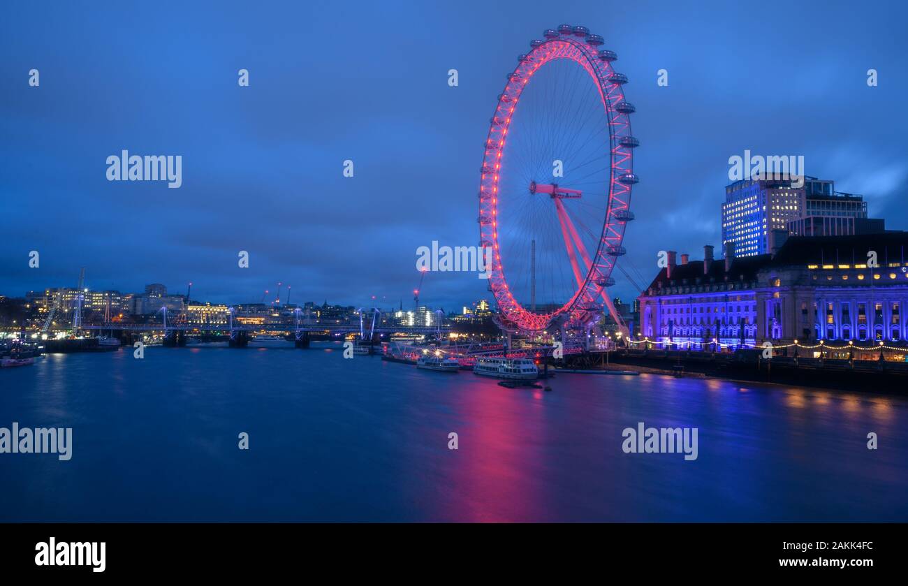 River Thames, London, UK. 9th January 2020. UK Weather: The London Eye and the lights of the City of London bring brightness on a dull and grey January morning. Credit: Celia McMahon/Alamy Live News. Stock Photo