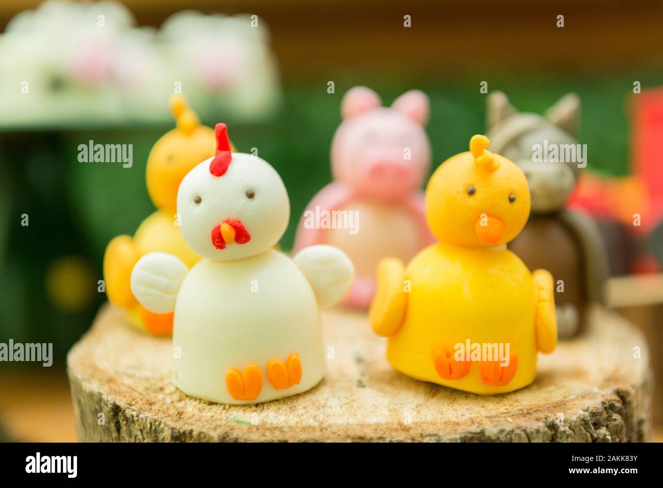 Kids Party Decoration - Farm Theme. Shaped candy personalized. Cake table detail. Handmade sweets with great care. Childhood and joy concept. Copy spa Stock Photo