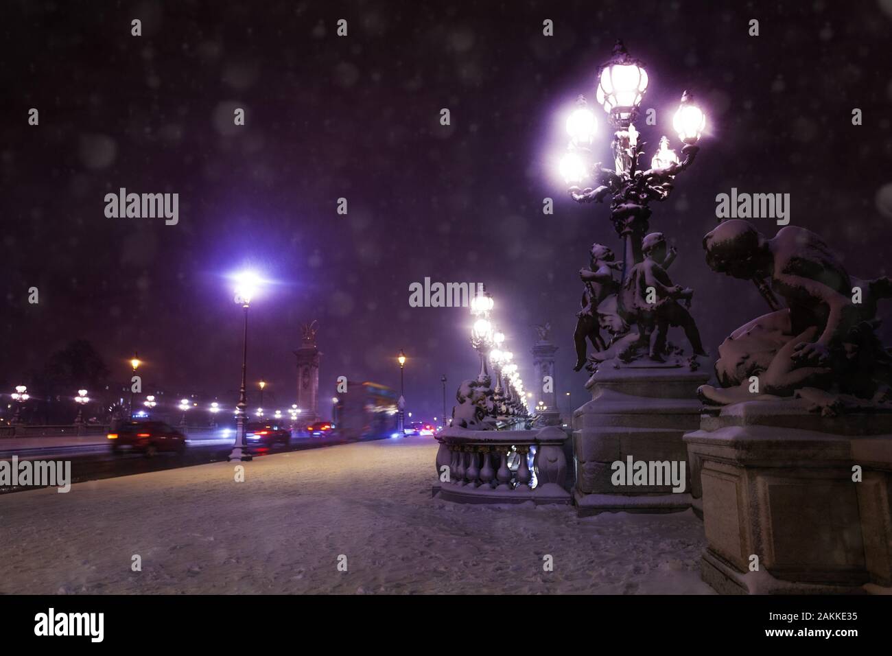 Alexander 3 bridge, Paris under snow at night Stock Photo