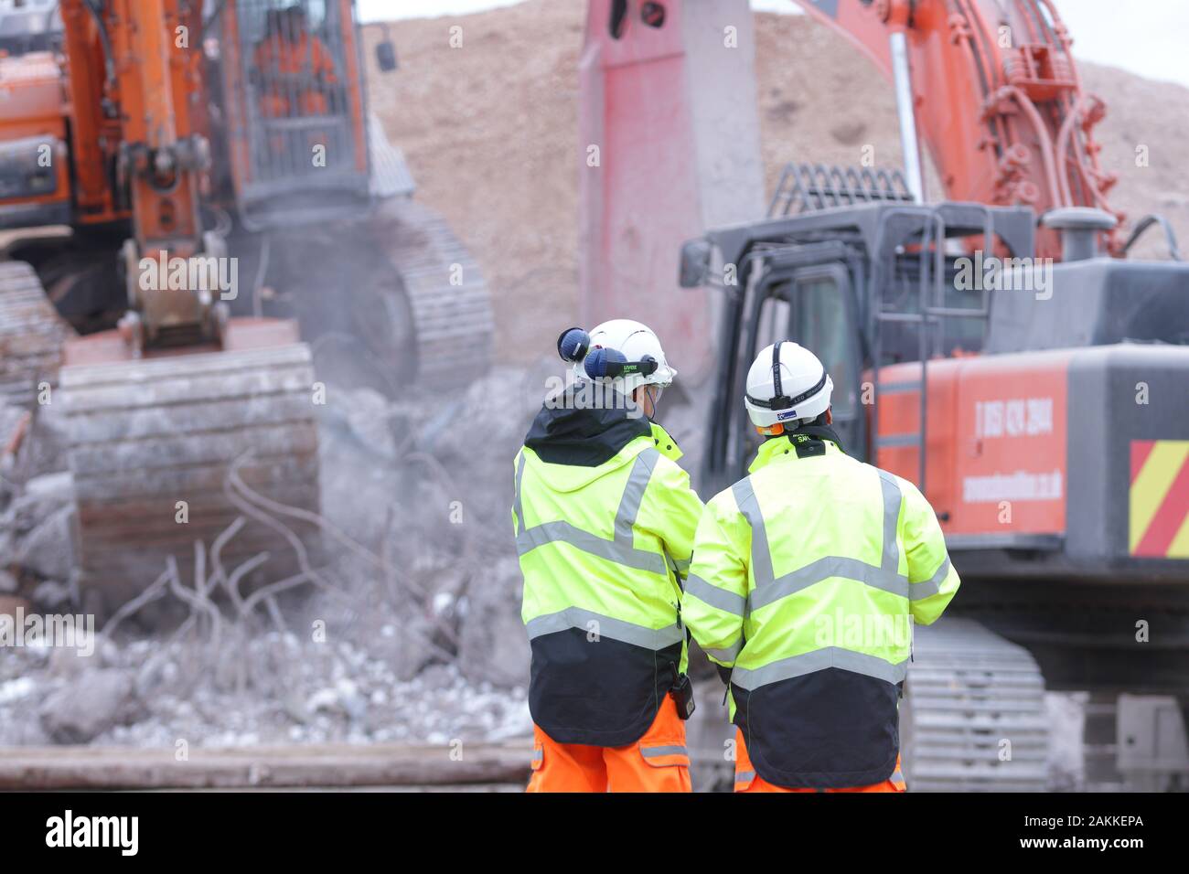 Works manager & Project manager watching the progress of the demolition of a bridge on the A50 in Uttoxeter Stock Photo