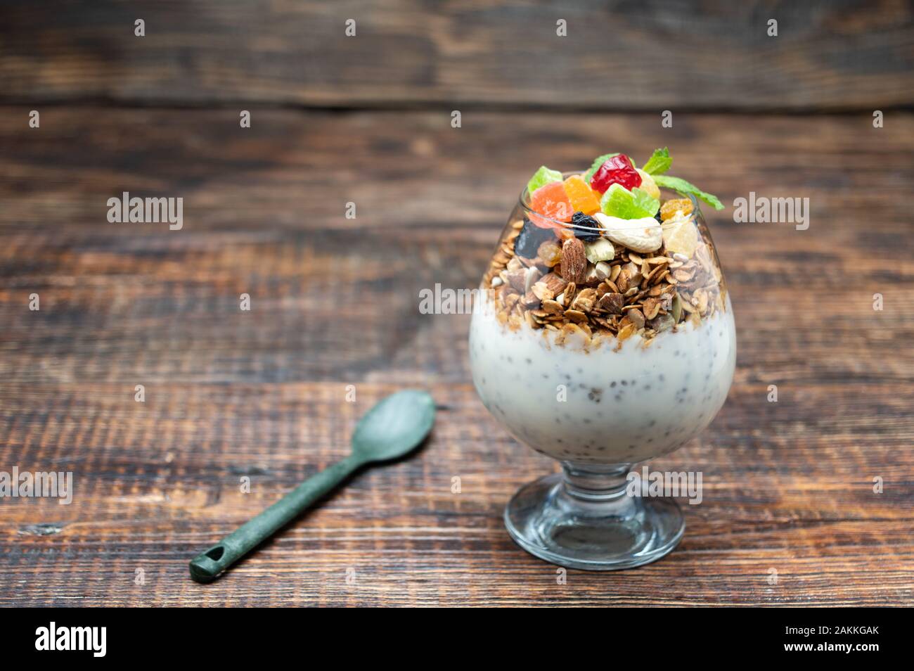 Mix of various nuts with yogurt. Breakfast with yogurt and nuts Stock