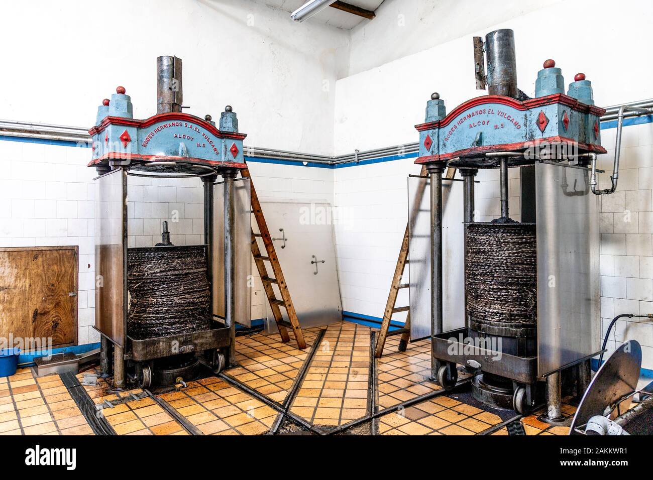 Traditional olive oil presses with stacked fiscoli mats, Can Det Olive Oil Mill in Soller, Mallorca, Spain Stock Photo