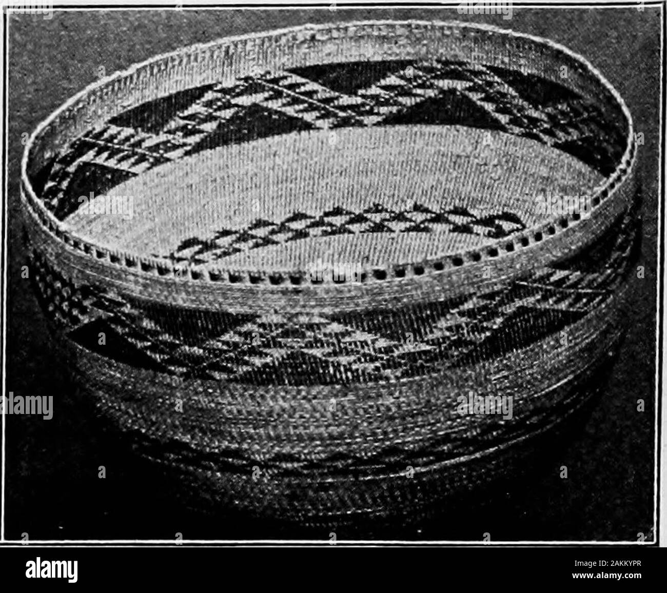 Pomo Indian baskets and their makers . -kalle or bam tree. The bams are the frame work; the thread is obtained from thebark of shrubs and the roots of trees and grasses. The mostimportant of these fibers is ka-hum, which is the root of asedge (Carex Mendocinoensis), which grows in deep, moist soilin most sections of the Pomo country. This sedge has long,slender, grassy leaves and a very long running root which isquite tough. The Indian women split these roots with theirteeth and coil them in bundles which are dried ready for use. When cured, ka-hum is of a light cream color, but deepenswith ag Stock Photo