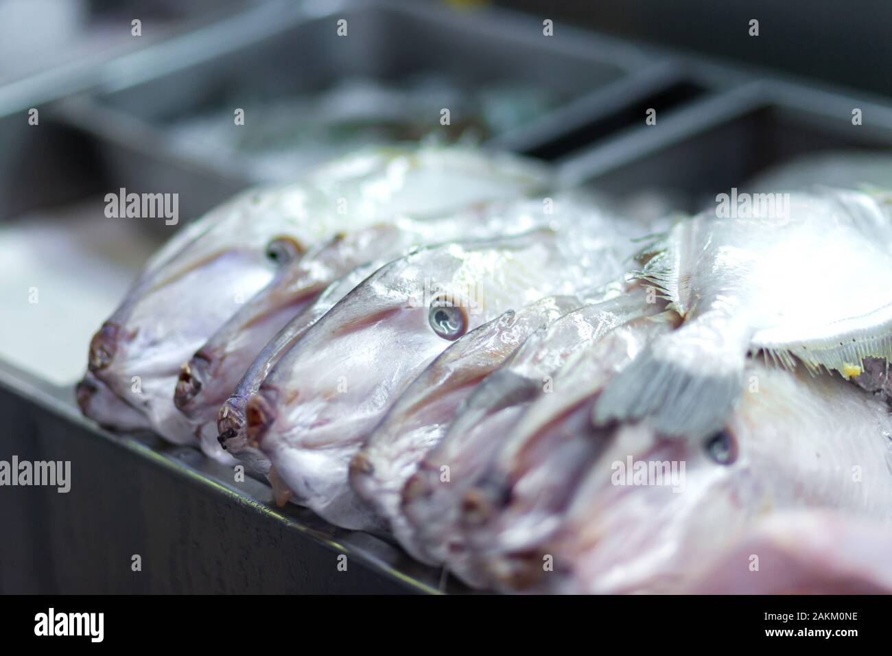 Asian street food. Fresh fish in a row Stock Photo - Alamy