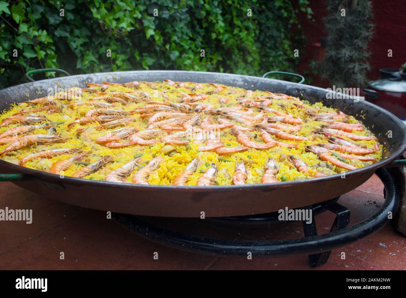 Nice paella in a paella pan outdoors Stock Photo Alamy