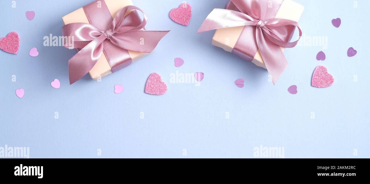 Valentines Day background with gift boxes with pink ribbon bow and ...