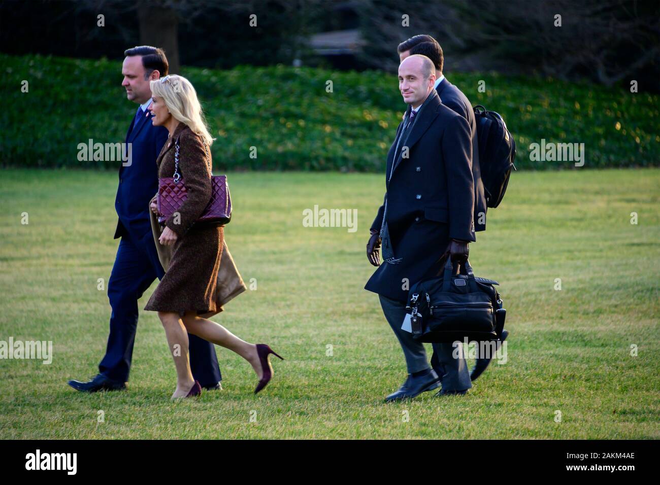 From left to right: White House Director of Social Media Dan Scavino, Senior Counselor Kellyanne Conway, and Senior Advisor for Policy Stephen Miller follow United States President Donald J. Trump to Marine One as he departs the White House in Washington, DC en route to Toledo, Ohio to deliver remarks at a Keep America Great Rally on Thursday, January 9, 2020. Credit: Ron Sachs/CNP | usage worldwide Stock Photo