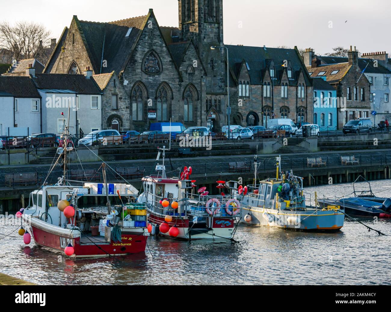 Fishing boats moored in Newhaven Harbour, Edinburgh, Scotland, UK Stock Photo
