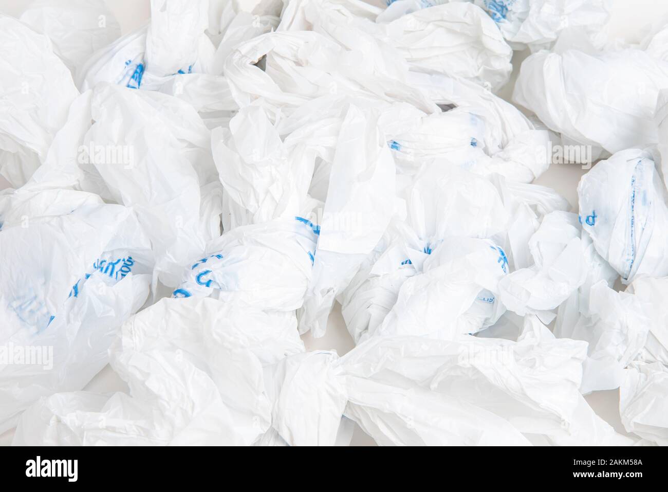 Blank black and white full loop handle plastic bag mockup, 3d endering.  Empty crumpled poly parcel mock up, top view, isolated. Clear cary wrapping  fo Stock Photo - Alamy