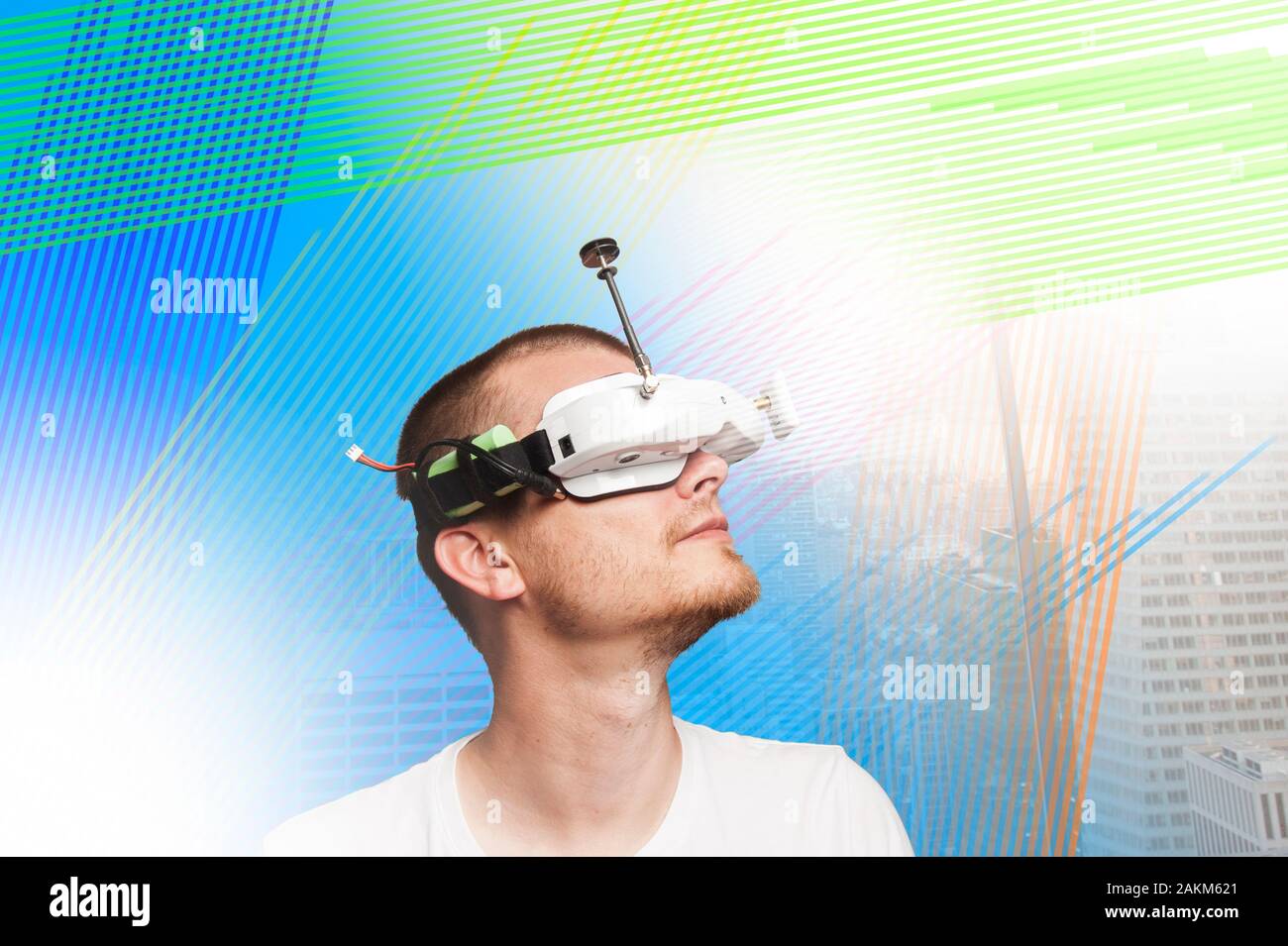 Guy with drone/vr Glasses. on a modern background with technology. modern  technology. handsome guy Stock Photo - Alamy