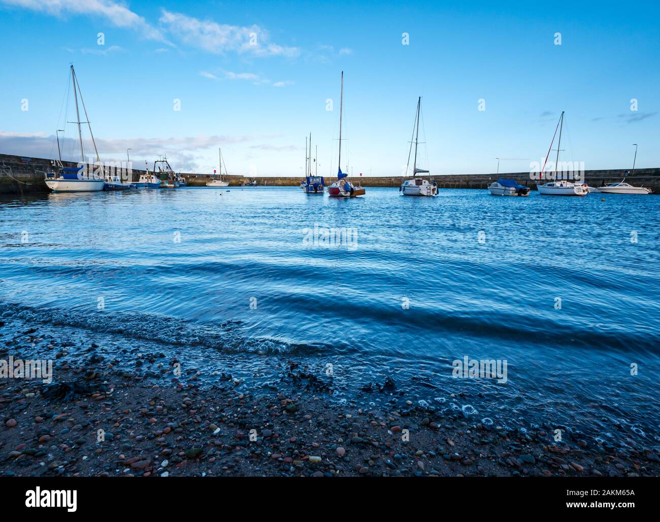 Moored sailing boats in Fisherrow Harbour, Musselburgh, Scotland, UK Stock Photo