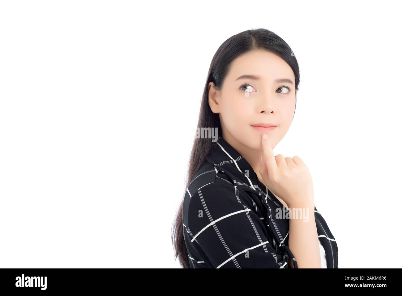 Portrait of asian woman thinking and holding touch mouth with hand, Beautiful girl use idea and with excited and surprise isolated on white background Stock Photo