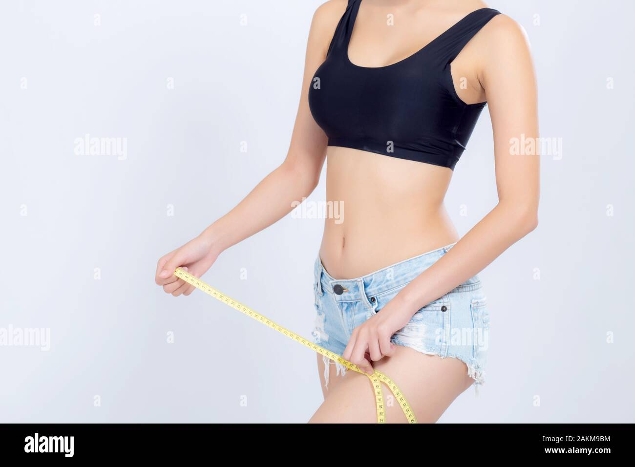 Closeup Caucasian Leg Slim And Body Of Woman With Measure