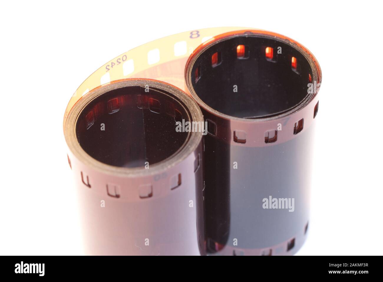 Old camera film on isolated white background Stock Photo - Alamy