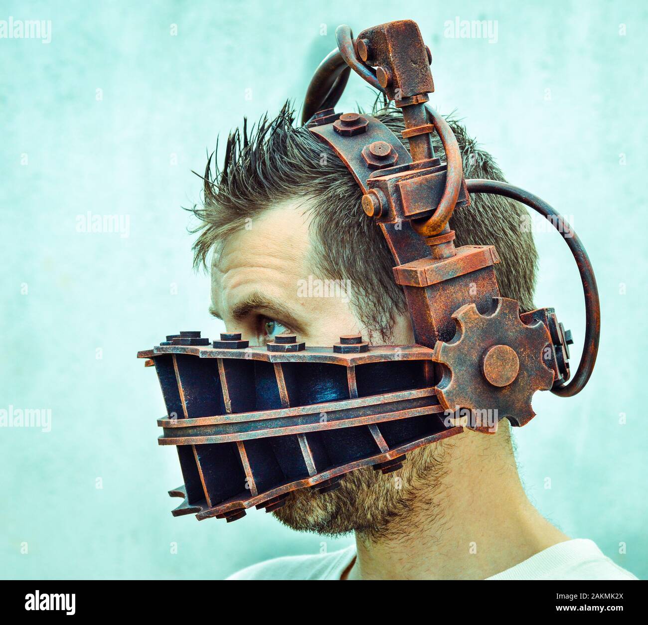 Man trapped by torture device  ( Reverse Bear Trap from the Saw movie ) Stock Photo