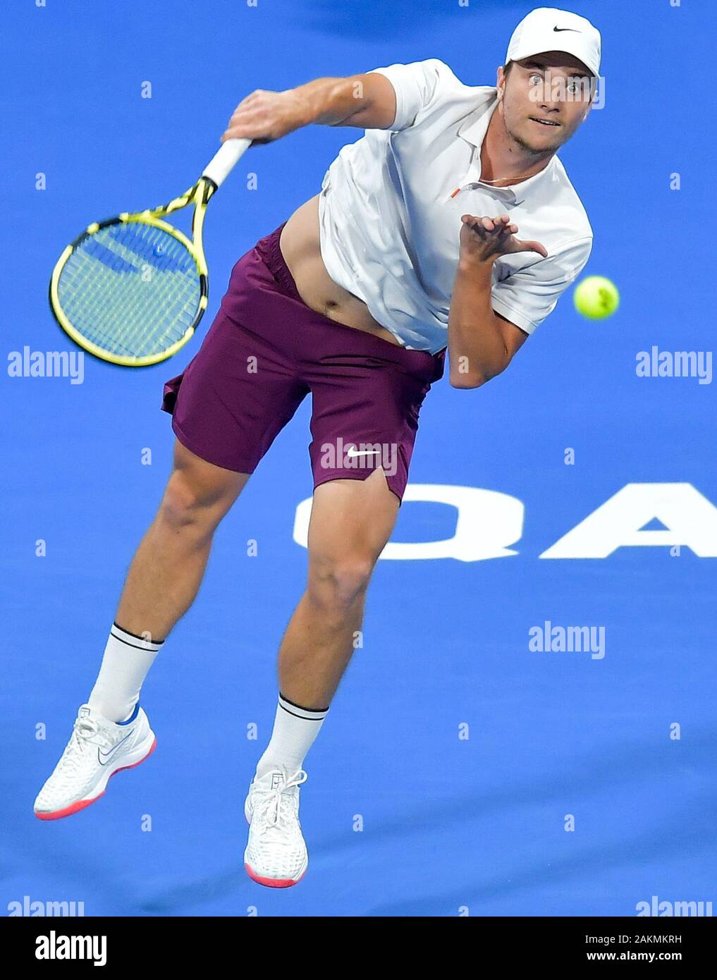 Doha, Qatar. 9th Jan, 2020. Miomir Kecmanovic of Serbia serves during the singles quarterfinal match against Marton Fucsovics of Hungary at ATP Qatar Open tennis tournament in Doha, Qatar, Jan. 9, 2020. Credit: Nikku/Xinhua/Alamy Live News Stock Photo