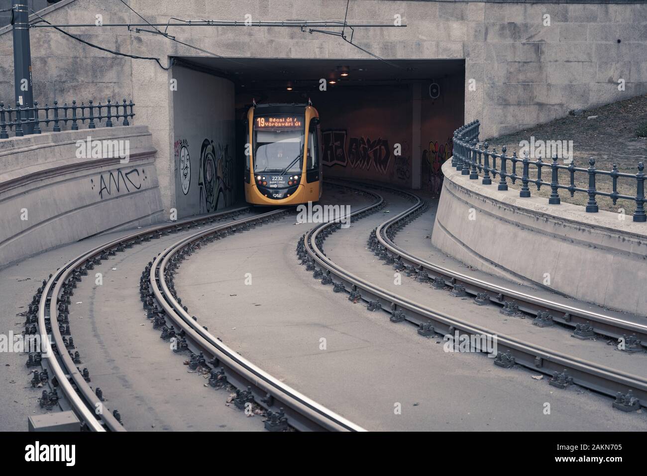 Budapest, Hungary - Local tram coming out of the tunnel Stock Photo