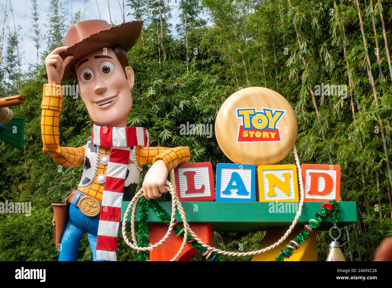 Woody from Toy Story invites guests to Toy Story World in Hollywood Studios park in Orlando Florida. Stock Photo