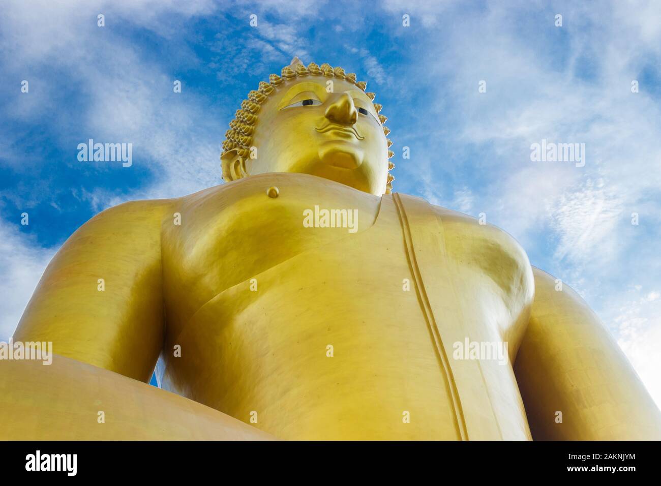 Golden buddha of statue on blue sky background in thailand Stock Photo ...