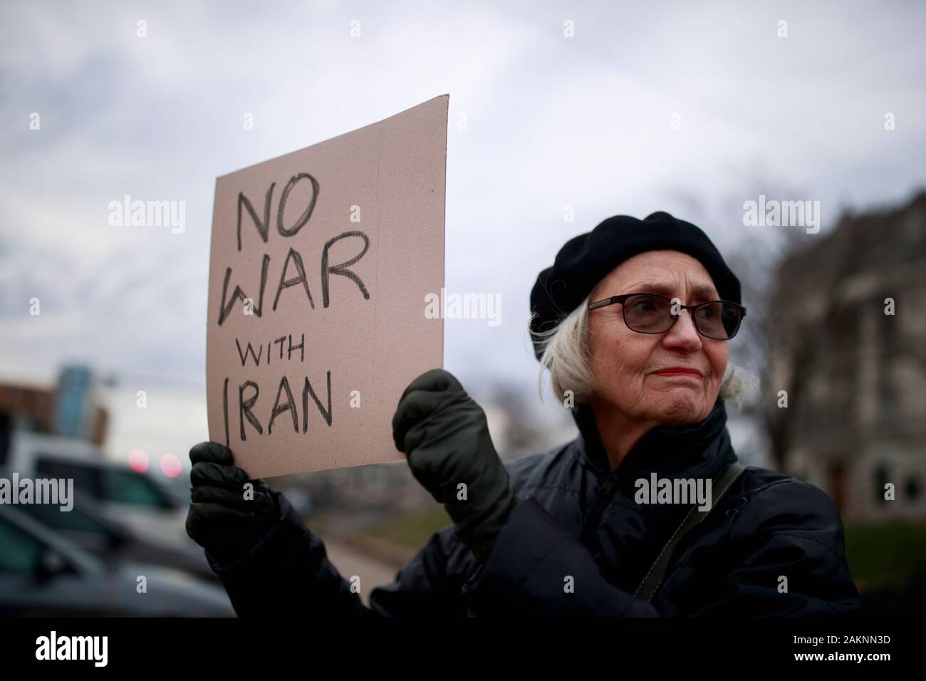Anti-war protesters stand on the steps of the Monroe Courthouse Square in Bloomington, Indiana to protest against the potential for a war between the United States, and Iran, Thursday, January 9, 2019 in Bloomington, Ind. The United States killed an Iranian general last week, which led to Iran speaking of revenge against the United States, and firing rockets at an American base in Iraq. (Photo by Jeremy Hogan/The Bloomingtonian) Stock Photo
