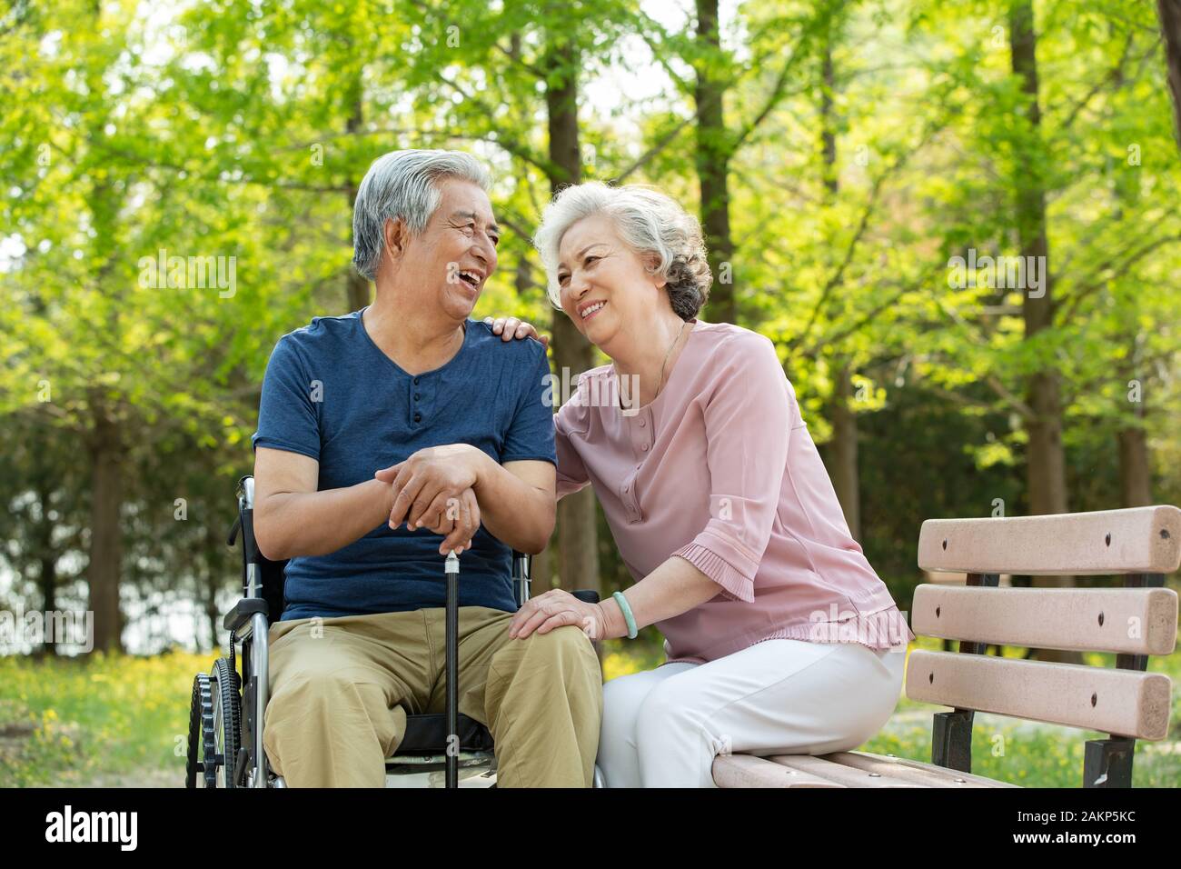 Elderly couple in the park Stock Photo - Alamy