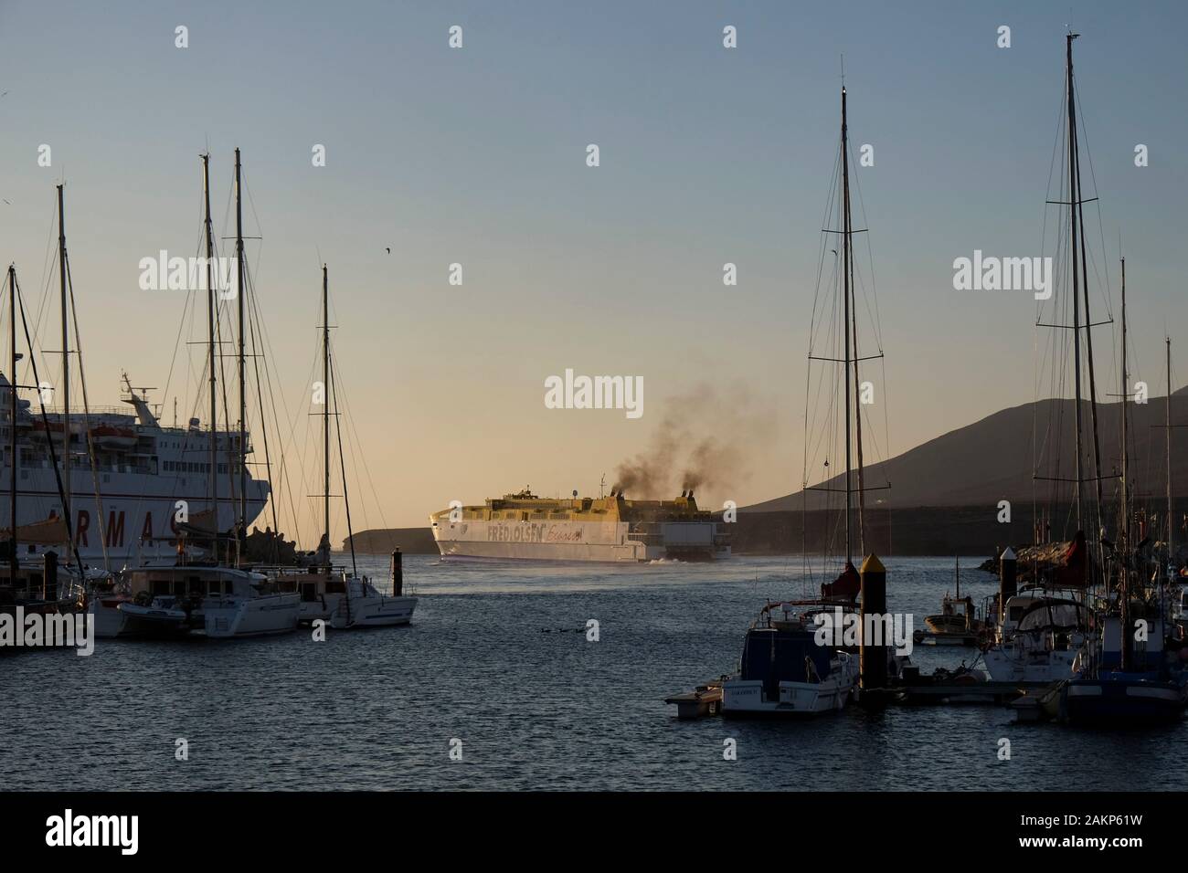 "Fred Olsen express" car ferry leaving Morro Jable harbour in the early evening, Fuerteventura, Jandia Peninsula, Canary Islands, Spain, Europe. Stock Photo