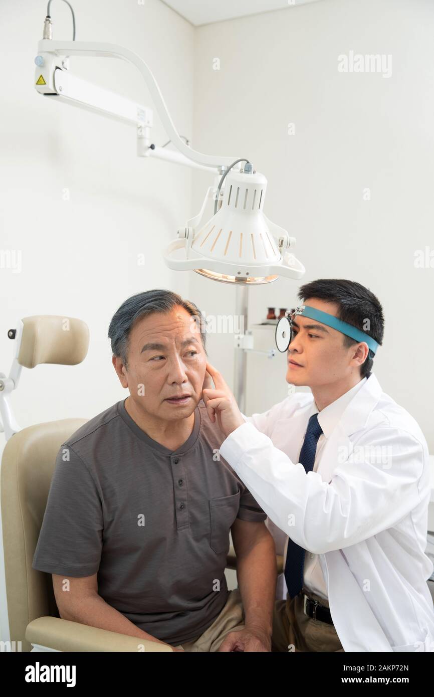 Doctors give patients to check the ear Stock Photo Alamy