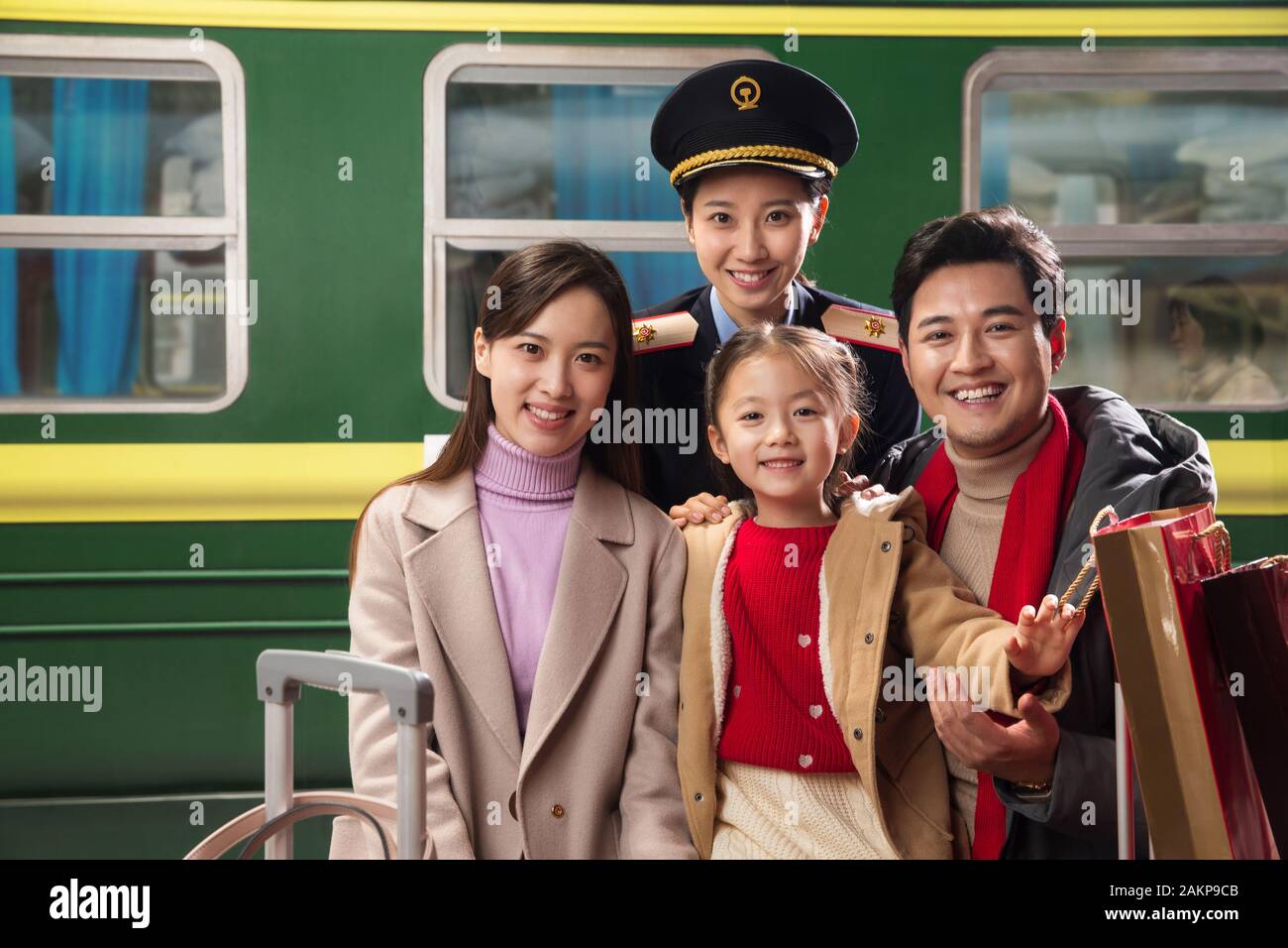 The train attendant and passengers Stock Photo