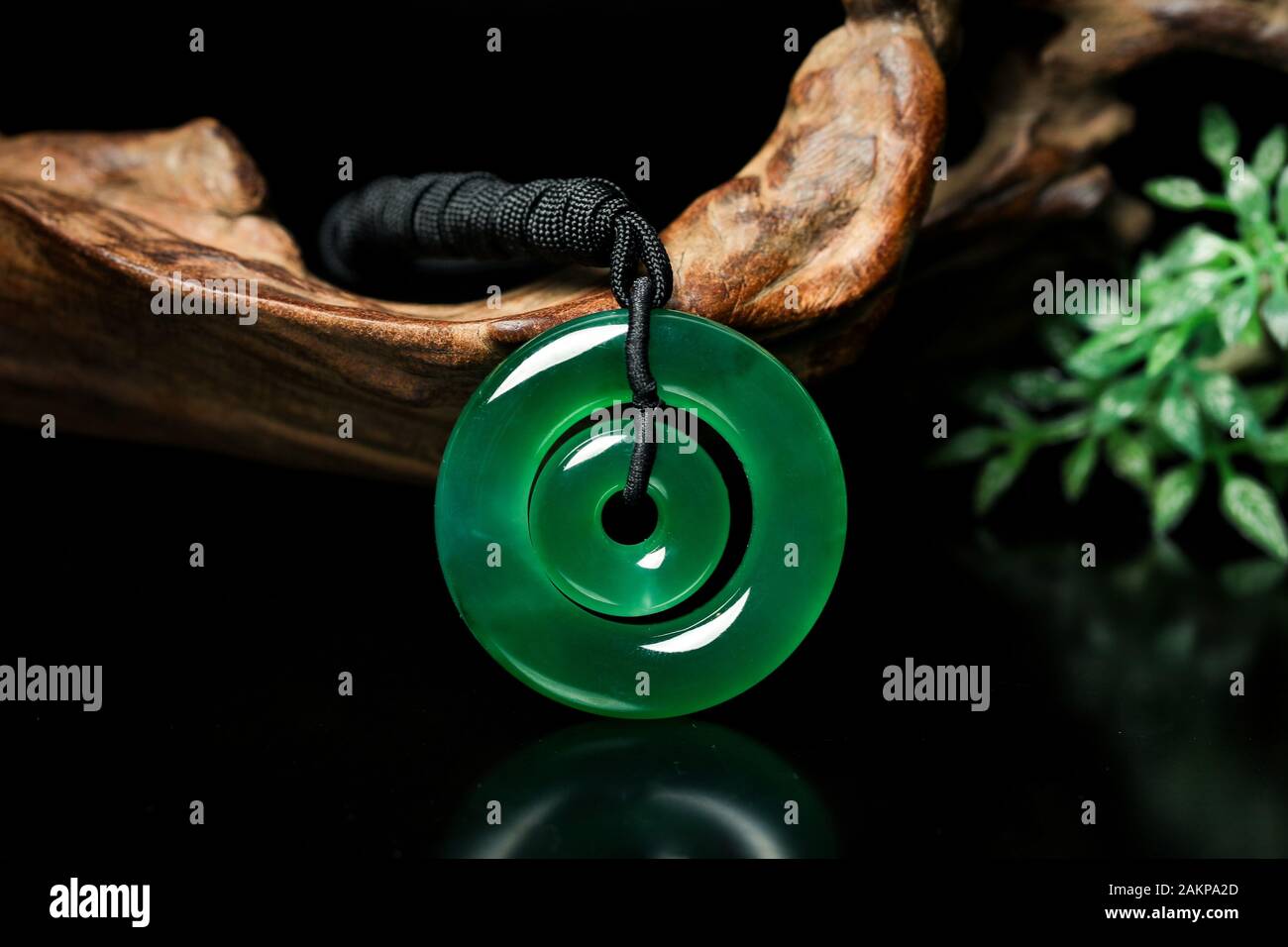 Round jade pendant features Stock Photo Alamy