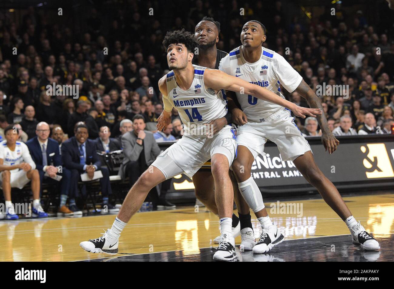 January 09, 2020: Memphis Tigers forward Isaiah Maurice (14) and Memphis  Tigers forward D.J. Jeffries (0) block out Wichita State Shockers center  Morris Udeze (24) on a free throw attempt during the