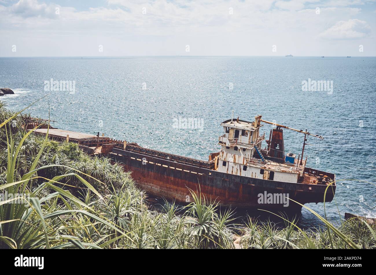 Shipwreck at a beach, Sri Lanka west coast, color toning applied. Stock Photo