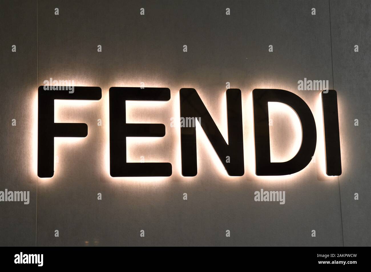 FENDI LOGO ON THE WALL IN THE NIGHT Stock Photo - Alamy