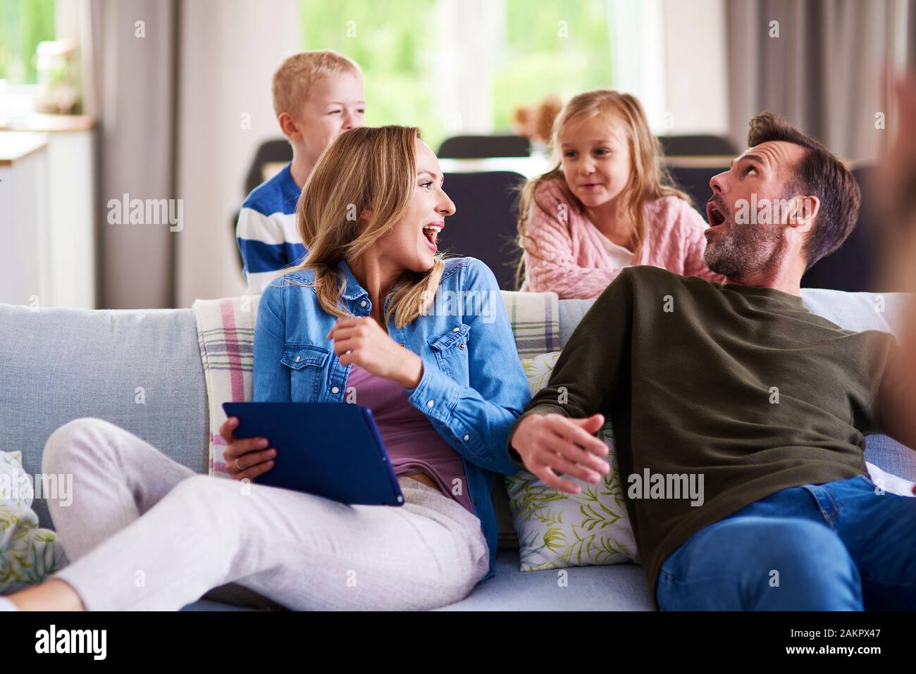 Positive family four people hi-res stock photography and images - Alamy