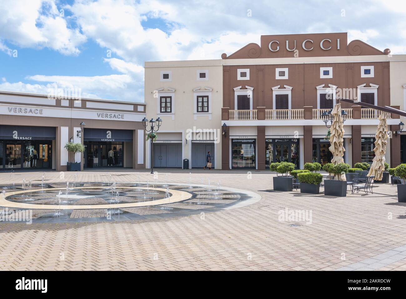 Gucci and Versace store in Sicilia Outlet Village located on Palermo-Catania motorway in Agira town on Sicily Island in Italy Stock Photo