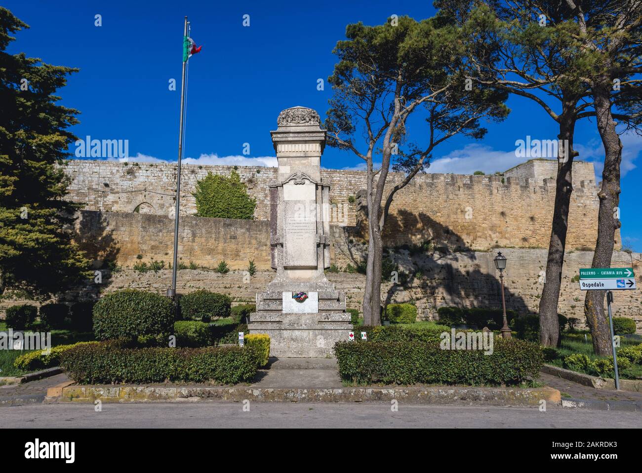 Monument to the fallen in both World Wars in front of Castello di Lombardia in Enna city and comune located at the center of Sicily in southern Italy Stock Photo