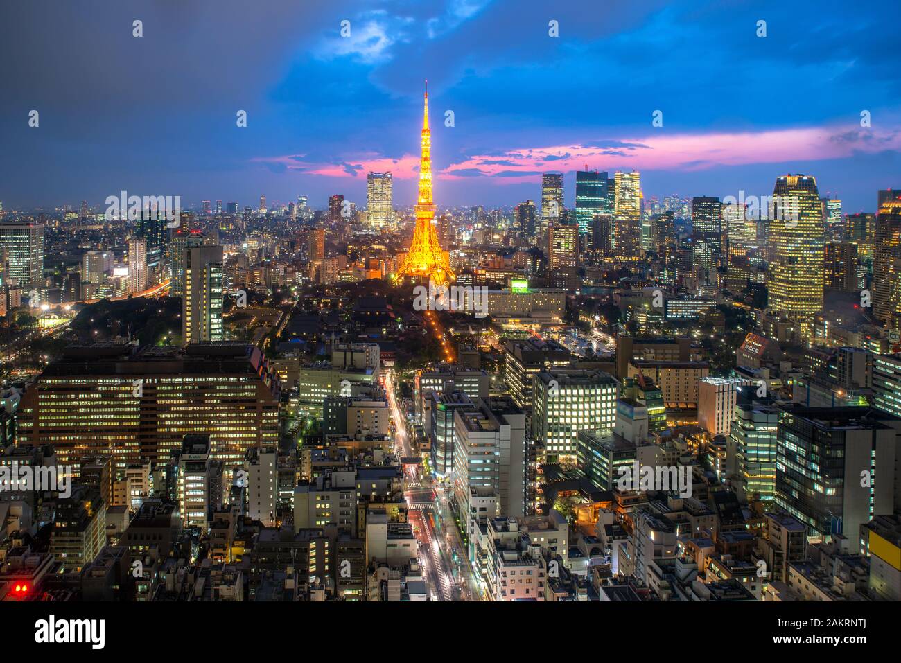 Tokyo city skyline view and office business building skyscraper downtown center with Tokyo Tower at evening in Japan. Asia tourism, modern city life, Stock Photo