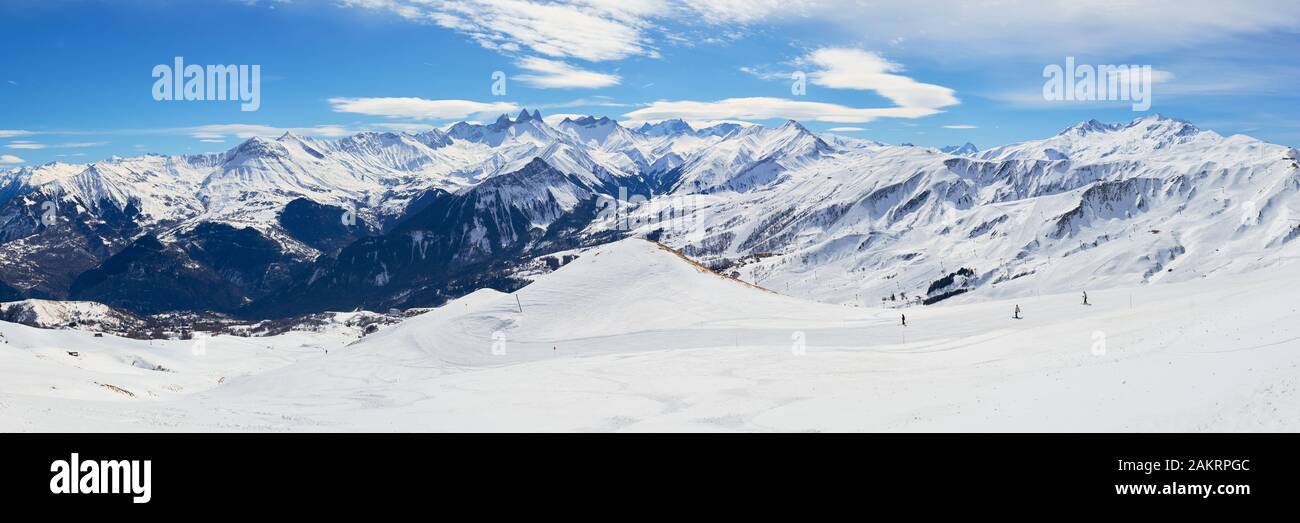 Les Sybelles ski domain in France. Panorama with slopes, skiers ...