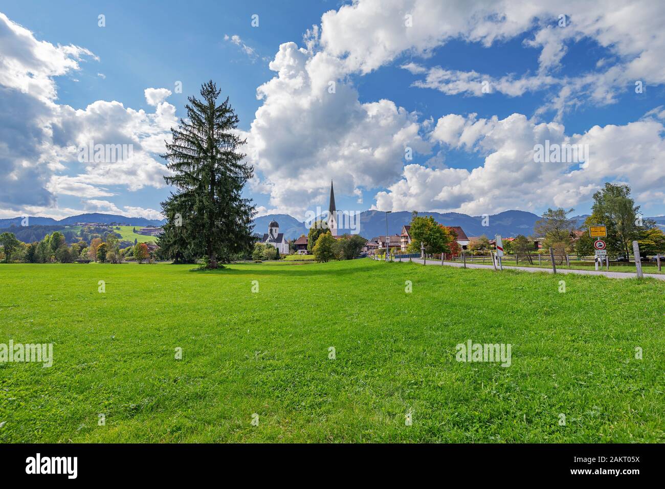 Fischen - View from meadows to Village of Fischen with View to chapel and parish church, Bavaria, Germany, Oberstdorf 25.09.2017 Stock Photo