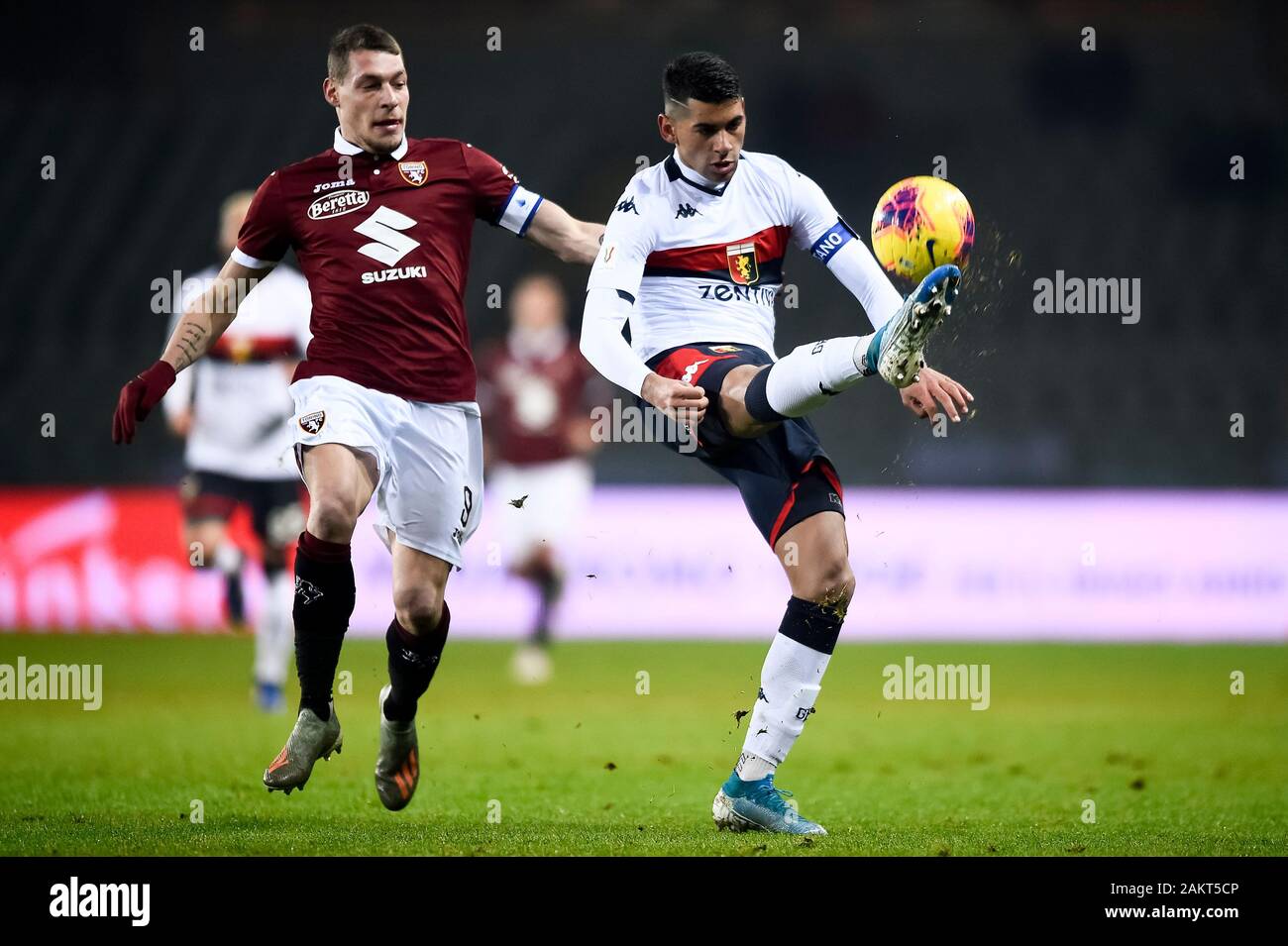 Turin, Italy - 09 January, 2020: Cristian Romero (R) of Genoa CFC competes for the ball with Andrea Belotti of Torino FC during the Coppa Italia football match between Torino FC and Genoa CFC. Credit: Nicolò Campo/Alamy Live News Stock Photo