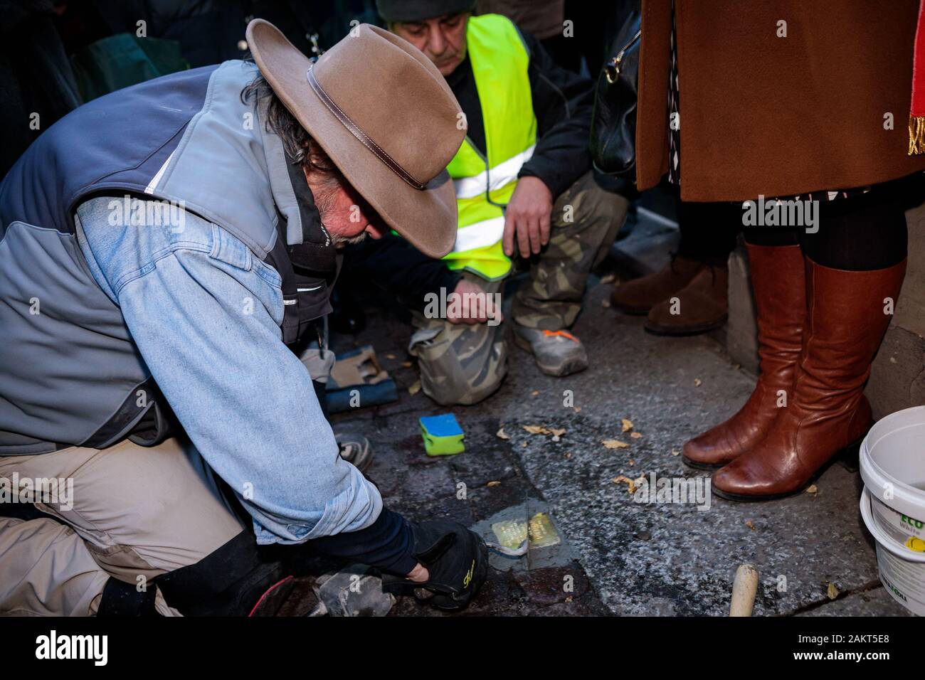 Bologna, Italy. 10th January, 2020. The German artist Gunter Demnig placing some stolpersteinen stumbling blocks in a few points of the city to remember the Jewish victims of the Nazism Holocaust on January 10, 2020 in Bologna, Italy. Credit: Massimiliano Donati/Alamy Live News Stock Photo