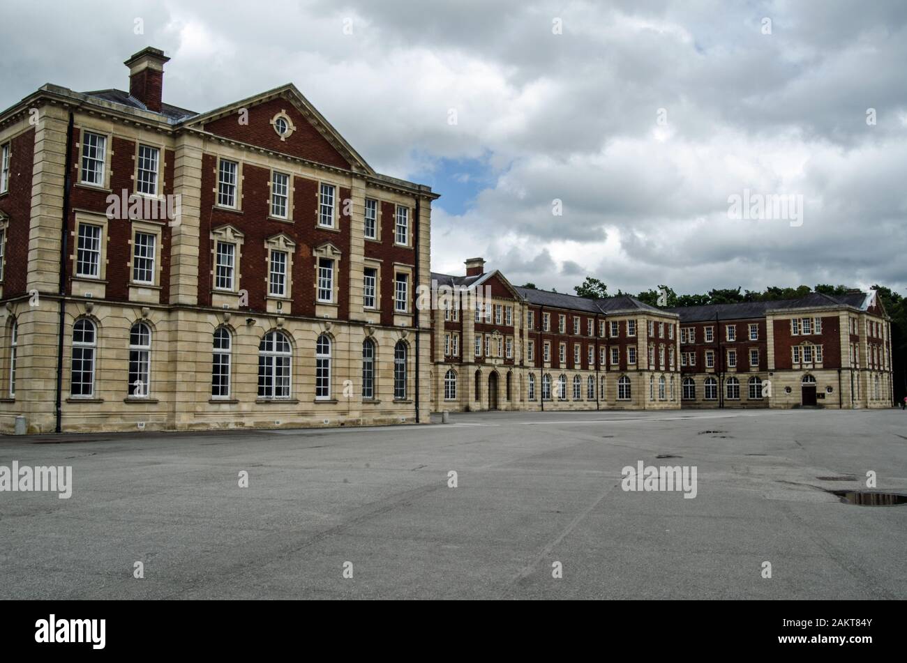 Wing of the Victorian New College buildings at the Royal Military Academy in Sandhurst where officers for the British Army are trained. Stock Photo
