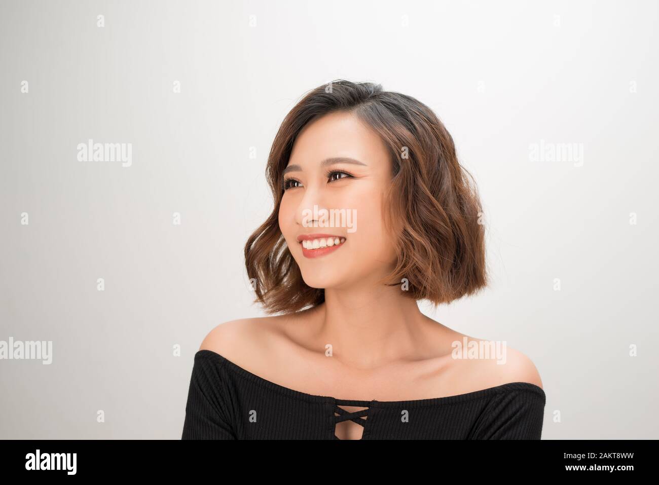 Closeup portrait of happy pretty young woman on white background Stock ...