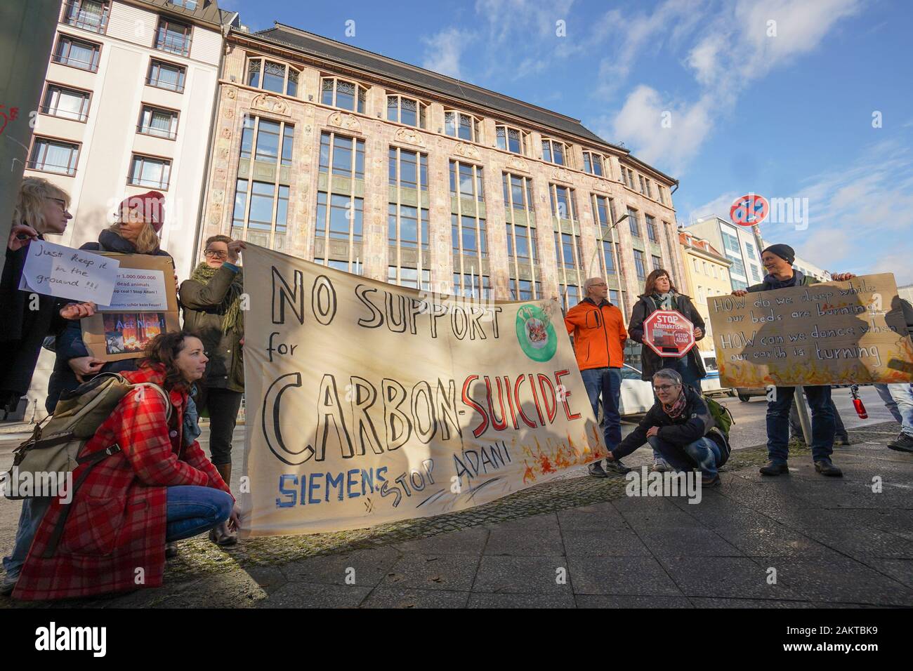 personificering sælger fordel Berlin, Germany. 10th Jan, 2020. A banner at a rally with the slogan "Adani  Stop Coal Mine" organized by Extinction Rebellion and Parents for Future in  front of the Australian Embassy reads,