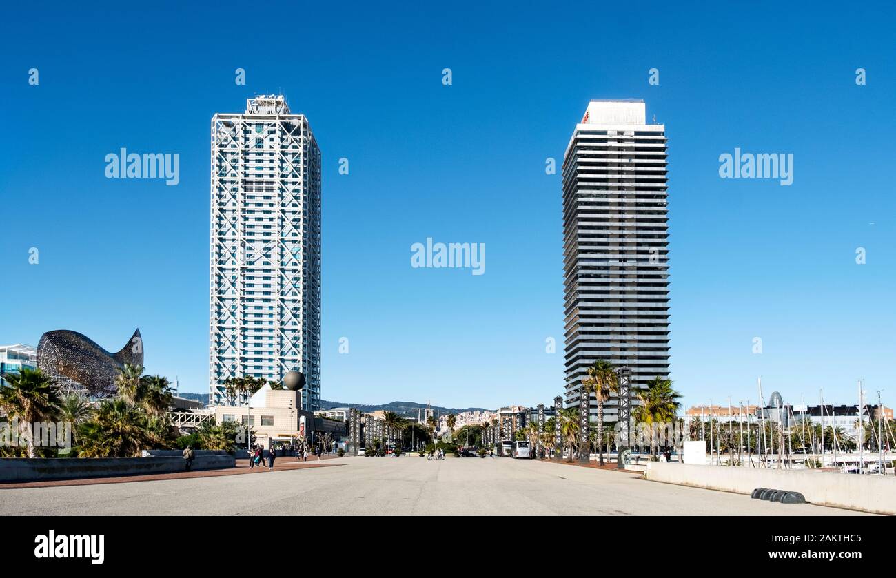 BARCELONA, SPAIN - DECEMBER 22, 2019: A view of the twin skyscrapers Hotel Arts and Mapfre Tower, at Vila Olimpica district, in the seafront of the ci Stock Photo