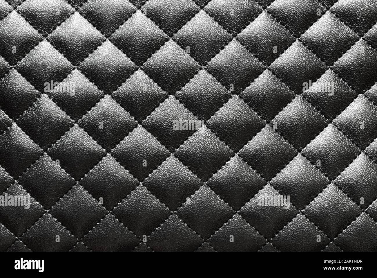 Texture of black quilted artificial leather for background Stock Photo ...