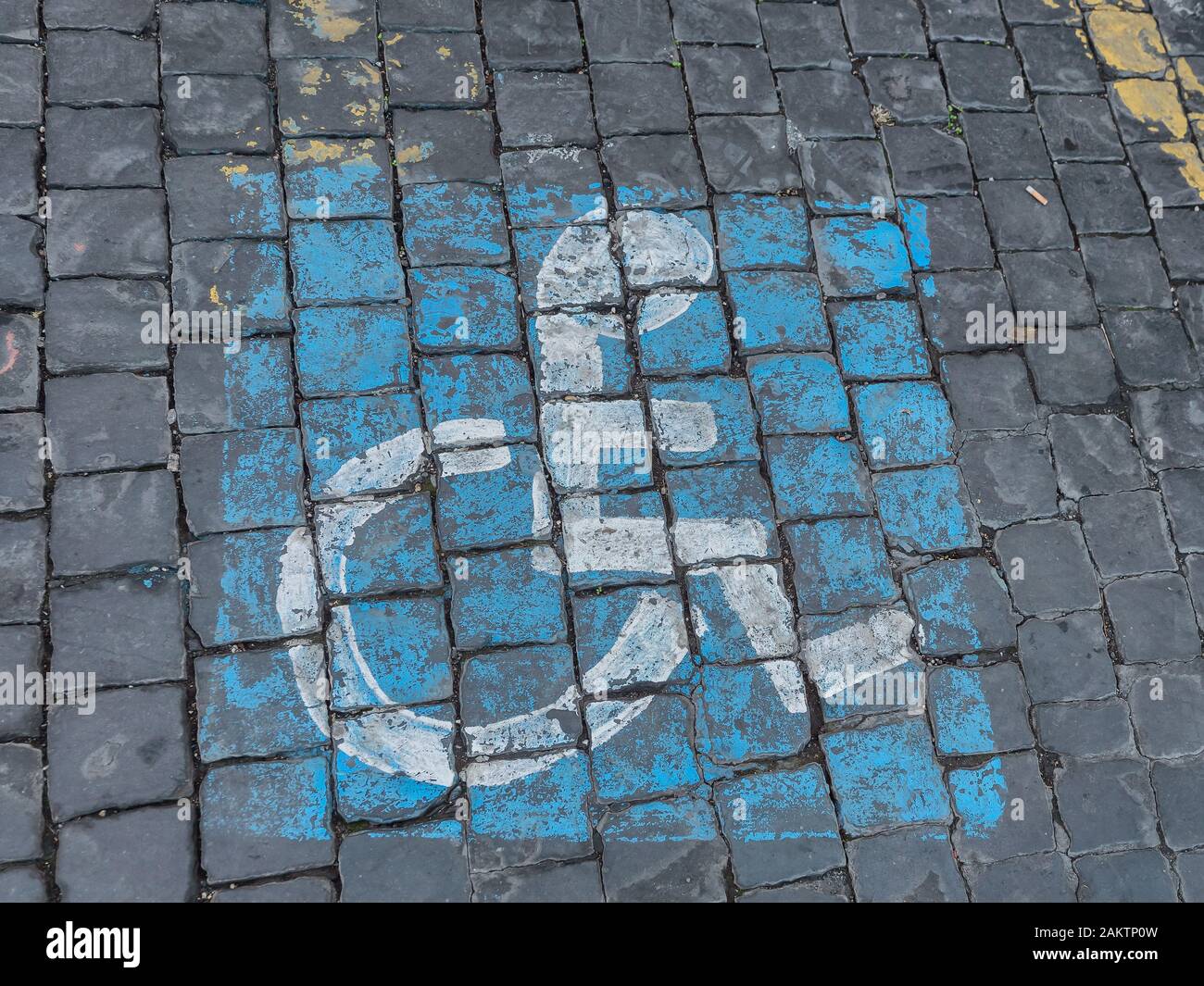 Handicap parking on the road in Rome, Italy Stock Photo