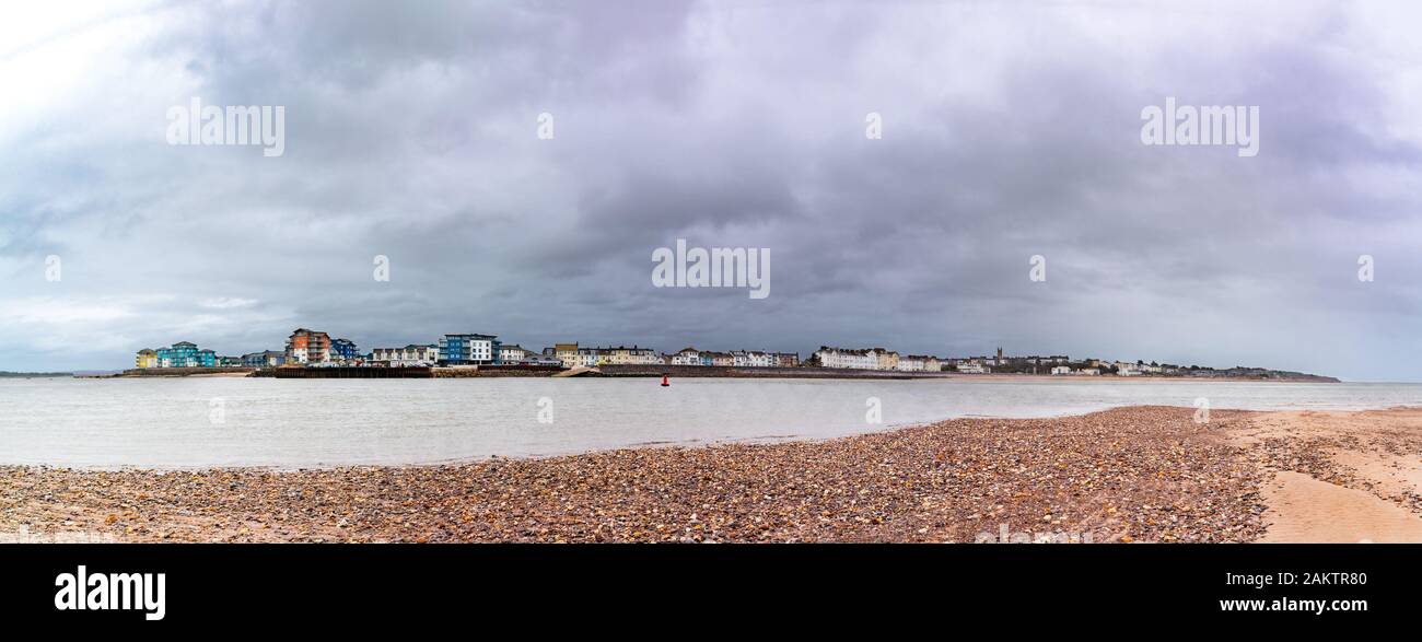 EXMOUTH, DEVON, UK - 5MAR2019: Complete panorama of Exmouth Seafront from the Marina (left) to Orcombe Point (right) as seen from Dawlish Warren. Stock Photo