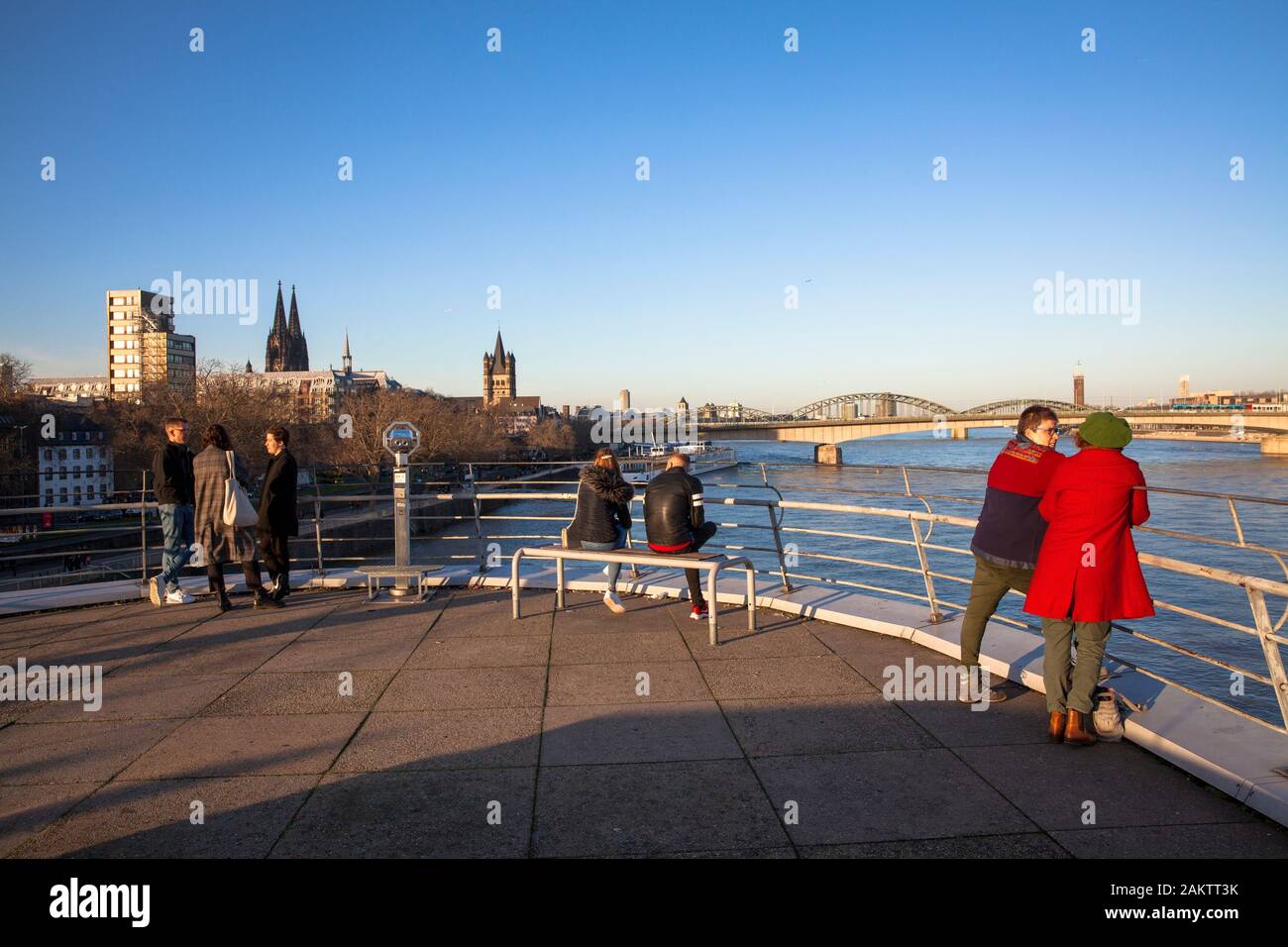 people on the observation deck of the Chocolate Museum at the Rheinau harbour, view to the cathedral and the church Gross St. Martin, Cologne, Germany Stock Photo