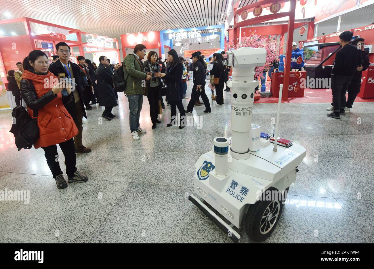 A police robot powered by the 5G wireless service of China Mobile patrols the East Hangzhou Railway Station during the annual Spring Festival travel r Stock Photo